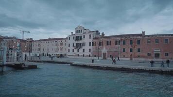 Venice, Italy - April 2, 2024 - The atmosphere of Venice in the late afternoon, the view from the water bus Venice Vaporetto. video