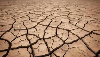 a dry, cracked earth with cracks in it photo