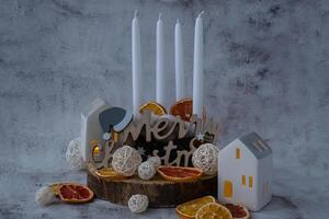 Step by step instruction of making handmade Christmas advent four weeks candle calendar. Female hands creating craft homemade decor. New year celebration. Winter holidays. Do it yourself photo