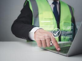 Architect or engineer Checking the list of documents and approving the project, Approved Buildings Permit concept with approved residential building project, Construction project inspection. photo