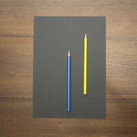 Notebook and pencil on a beautiful background in a large photo studio