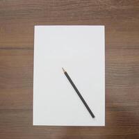 Notebook and pencil on a beautiful background in a large photo studio