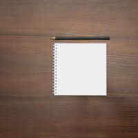 Notebook and pencil on a beautiful background in a large photo studio