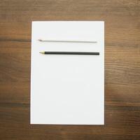 Notebook and pencil on a beautiful background in a large photo studio