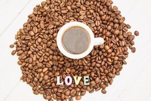 Fresh coffee beans on a beautiful background photo