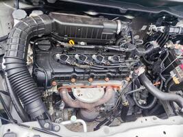a car engine with its hood open photo