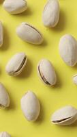 Closeup of pistachio nut seeds pattern texture background, macro pistachios nuts video