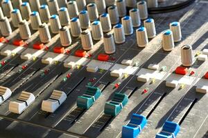 Mixing console for controlling the volume, frequencies of musical instruments photo