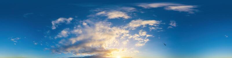 Dark blue sunset sky panorama with Cumulus clouds. Seamless hdr pano in spherical equirectangular format. Complete zenith for 3D visualization, game and sky replacement for aerial drone 360 panoramas. photo