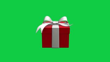 3d red gift box with white ribbon rotating loop animation on green screen background video