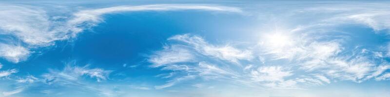 Blue sky with light clouds Seamless panorama in spherical equirectangular format with complete zenith for use in 3D graphics, game and for composites in aerial drone 360 degree panoramas as a sky dome photo