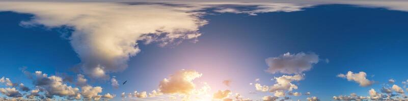 Dark blue sunset sky panorama with Cumulus clouds. Seamless hdr pano in spherical equirectangular format. Complete zenith for 3D visualization, game and sky replacement for aerial drone 360 panoramas. photo