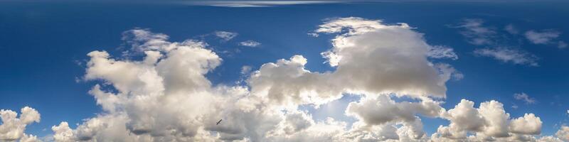 Blue sky panorama with puffy Cumulus clouds. Seamless hdr pano in spherical equirectangular format. Sky dome or zenith for 3D visualization, game and sky replacement for aerial drone 360 panoramas. photo