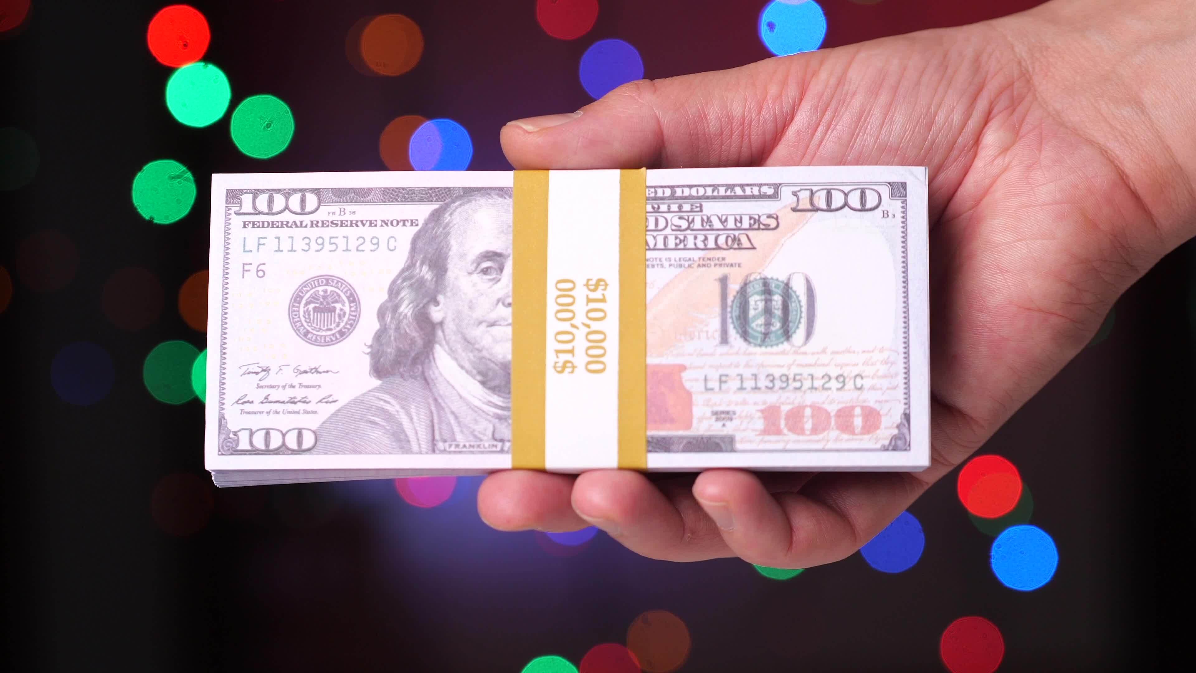 de-cerca-un-paquete-de-dolares-en-banco-embalaje-10-000-dolares-en-uno