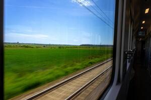 view from a moving train carriage to the platform, travel concept, smash train platform photo