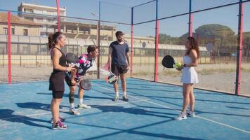 Padel Instructor Explains The Sports Game To Her Students In The External Field video