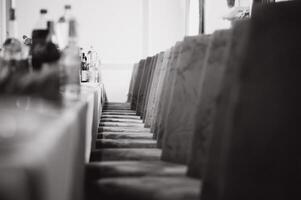 Glasses on the festive table setting. Wedding table decor concept. Table setting in classic style, setout. fine art. photo