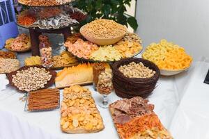 Meat and cheese appetizers. Antipasti and catering platter with different meat and cheese products. photo