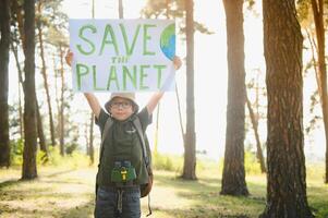 demonstration against global warming and pollution. Child boy making protest about climate change, plastic problems, global warming, pollution. Save the planet poster. Climate Strike. Eco Activism. photo