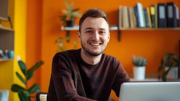 Smiling Young Tech Professional Relaxed in Vibrant Home Office Environment photo