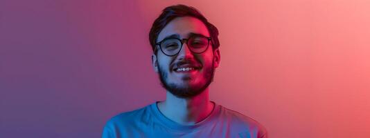 Smiling Young Software Engineer Working on Vibrant Color Background photo