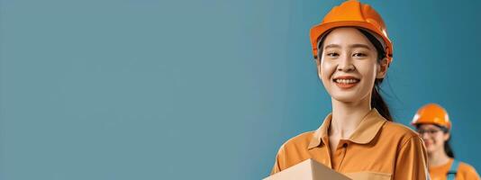 Smiling Young Woman Construction Worker in Hardhat on Colorful Background photo