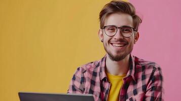 Portrait of Smiling Young Professional Web Developer Working in Colorful Studio Environment photo