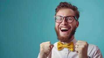 Joyful Young Business Executive Celebrating Success in the Workplace photo