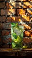 Refreshing Mojito Cocktail With Lime and Mint on Wooden Table photo