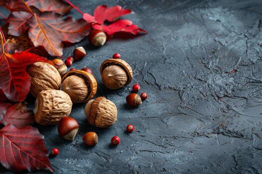 Assorted Nuts and Leaves on Slate Surface During Autumn Season photo
