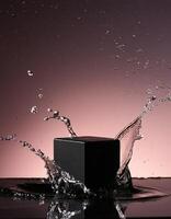 empty black podium mockup with water splash on a pink gradient background for product display photo