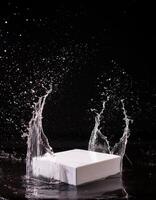 empty podium mockup with water splash on a black gradient background for product display photo