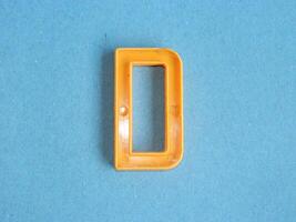 Macro photo or closeup photo of the alphabet from children's toys on a blue background. Use on preschool also