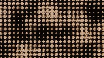 Concert tiny round shaped elements on a black background. Design. Panel with the LED bulbs with glowing lights. video