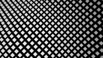 White and blue background. Design. A black grid of small squares in an abstraction that wobbles in different directions. video