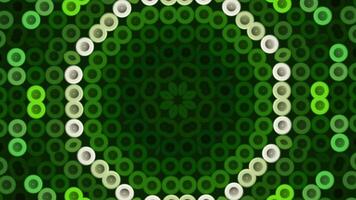 Green background. Media.The green background is made like a mosaic and how it changes like a kaleidoscope. Various patterns of green details that flash colors. video