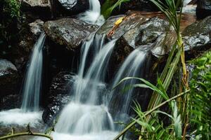 This unspoiled seasonal waterfall in the middle of the wilderness is called the Grenjengan Kembar waterfall. Detailed photos of the waterfall using a slow shutter speed technique