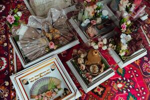 The offering box contains a wedding dowry with Indonesian culture. The dowry given by the groom to the bride when she is about to get married, contains beautifully and attractively decorated items photo