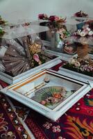 The offering box contains a wedding dowry with Indonesian culture. The dowry given by the groom to the bride when she is about to get married, contains beautifully and attractively decorated items photo