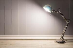 Copy space of Table lamp on wood table with grey background photo