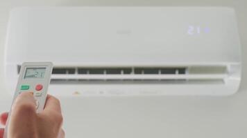 Adjusting Air Conditioner Temperature with Remote Control video