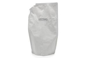 Used Refill packet or bag. Zero waste. Reuse reduce recycle concept. refill conditioner. Plastic packaging for refill pouch isolated on white background. clipping path. photo