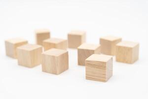 Wooden cube or wooden blocks isolated on a white background. Pile of wood block. Copy, empty space for text. photo