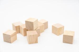 Wooden cube or wooden blocks isolated on a white background. Pile of wood block. Copy, empty space for text. photo