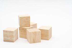 Wooden cube or wooden blocks isolated on a white background. Pile of wood block. Copy, empty space for text. photo
