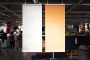 Empty sign inside shopping mall. mock up advertise display frame setting over the shopping department store for shopping. copy space photo