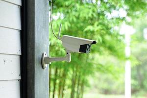 CCTV monitoring the building for the safety of the property and inspecting people entering and exiting the building. Soft and selective focus. photo