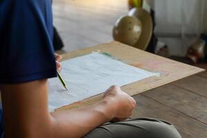 Students draw pictures of objects with various shapes. Placed as a model on the table for students to practice drawing light and shadow. soft and selective focus. photo