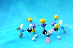Simulate Shape of covalent molecules on a blue background. Soft and selective focus. photo