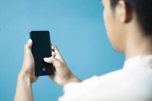 Businessman using mobile phone close-up, isolated image ,communication concept , fingerprint scanning strip photo